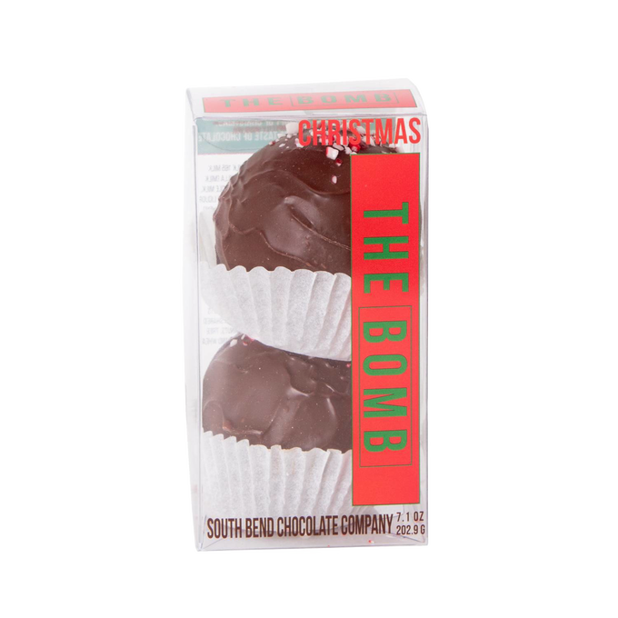 Clear packaging showing two handcrafted chocolate bombs with crushed peppermint candy topping in white paper cups, made in USA, perfect for Kitchen & Food, Snacks and Sweets, Beverages, USA Made, Best Sellers, and Promo Eligible collections.