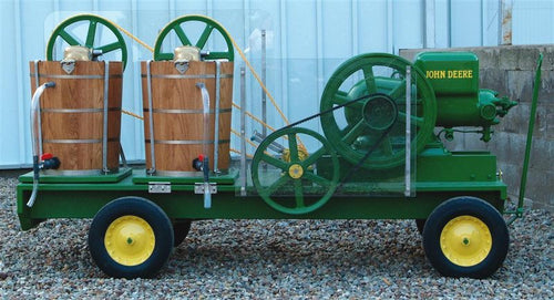 Green and wooden ice cream trailer featuring two wooden barrel freezers and a 1.5 hp John Deere engine, suitable for Kitchen & Food, Specialty Equipment, Making Ice Cream, and Best Sellers collections.