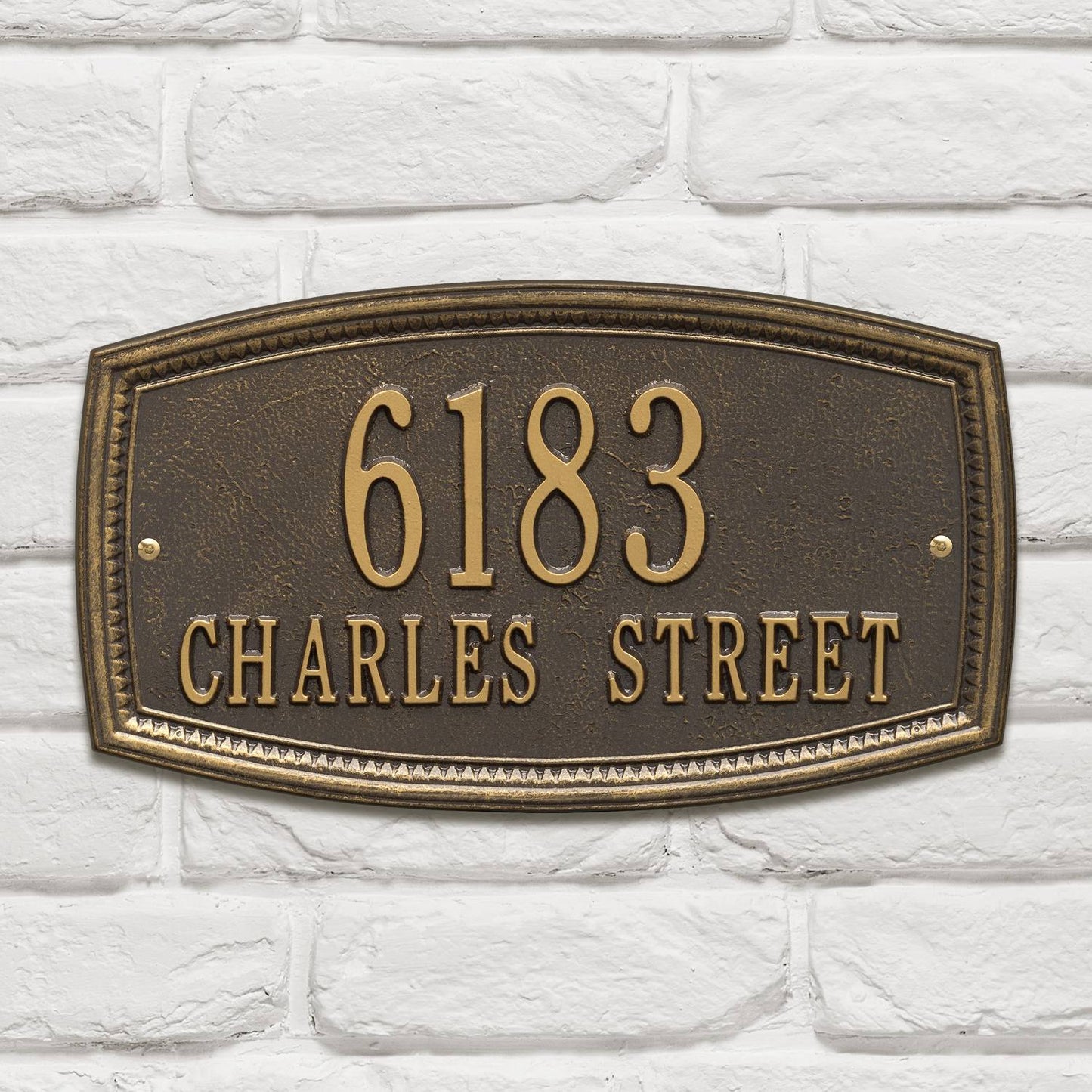Custom bronze metal wall plaque with raised numbers and street name on a textured background, designed to enhance curb appeal, part of Home & Decor, USA Made, and Best Sellers collections.