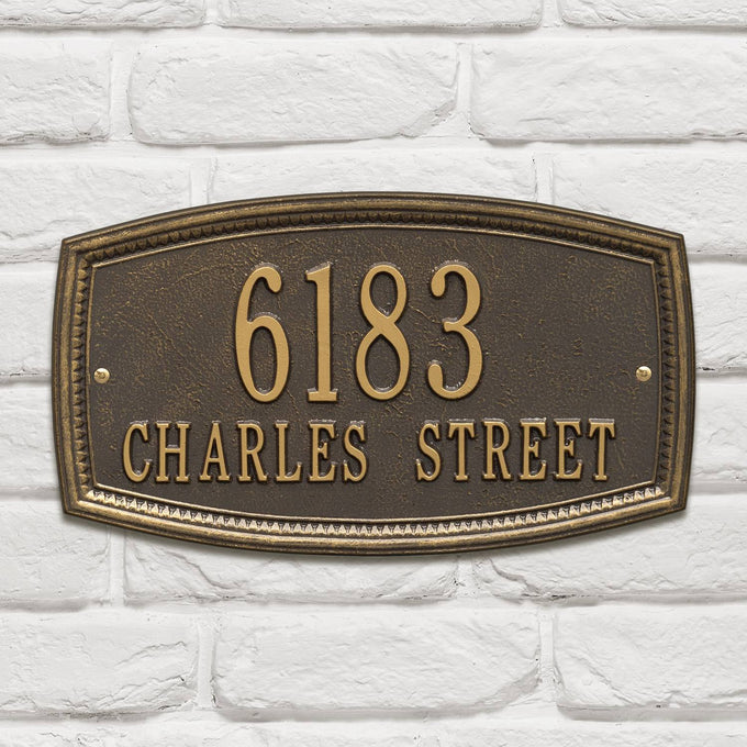Custom bronze metal wall plaque with raised numbers and street name on a textured background, designed to enhance curb appeal, part of Home & Decor, USA Made, and Best Sellers collections.