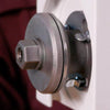 Close-up of a sturdy metal nut butter accessory part for a grain mill, showcasing a durable, precision-machined fitting designed for easy attachment in kitchen and food, grain mills, USA made collections.
