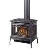 Large cast iron freestanding gas stove with three-sided glass panels showcasing flickering flames, designed for efficient heating in stoves, heatstoves, and best sellers collections.