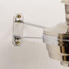 Close-up of the chrome-plated wall bracket supporting a polished oil lamp, showcasing durable metal construction ideal for farm, garden, emergency, and lighting needs.
