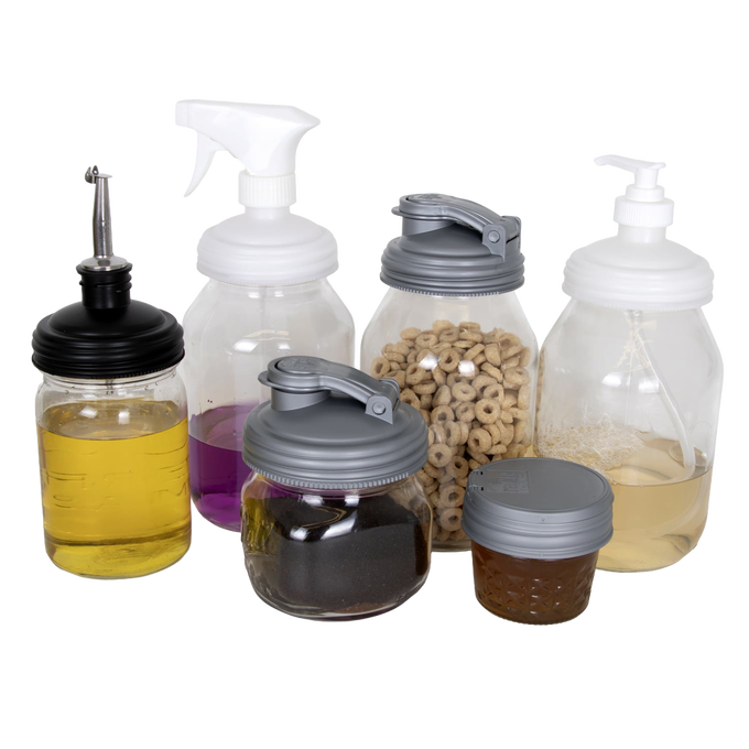 Set of seven reusable Mason jar lids in black and gray styles including pour spout, pump dispenser, spray top, and screw cap, eco-friendly and handcrafted for Home & Decor and Household Helpers in USA Made and Best Sellers collections.