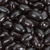 Close-up of shiny, jumbo-sized black licorice jelly beans clustered together, a popular candy featured in Kitchen & Food, Snacks and Sweets, Best Sellers, and Promo Eligible collections.