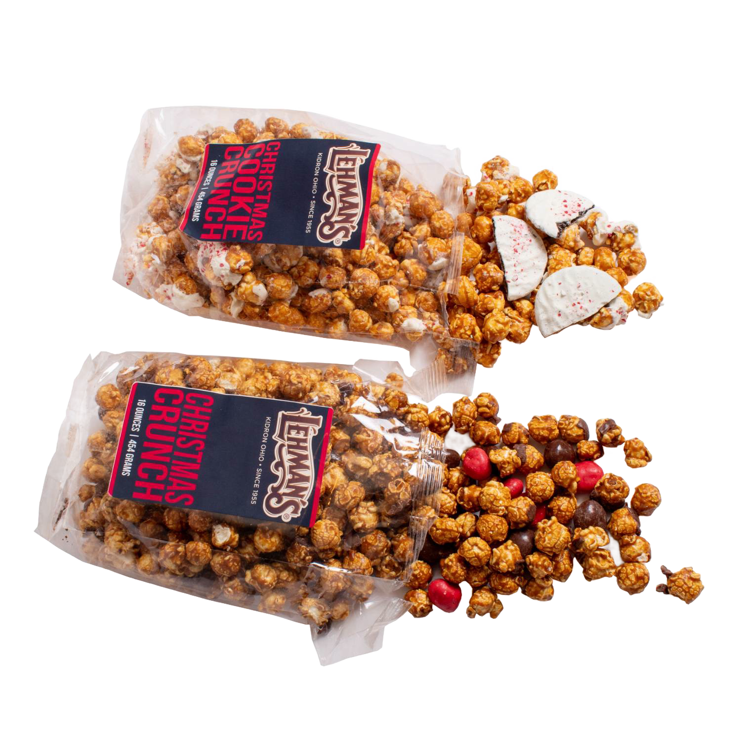 Two clear bags of handcrafted caramel popcorn with holiday-themed additions spilling out, including white chocolate peppermint bark pieces and red candy, for Kitchen & Food, Snacks and Sweets, Popcorn, and Best Sellers collections.