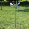 Handcrafted metal windmill with polished blades mounted on a slender rod, designed for humane mole deterrence in farm, garden, lawncare, pest control, and best sellers collections.