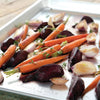 Aluminum half sheet pan with roasted baby carrots, beets, and garlic cloves, garnished with fresh thyme, featured in Kitchen & Food, Cookware, Baking Supplies, and USA Made collections.