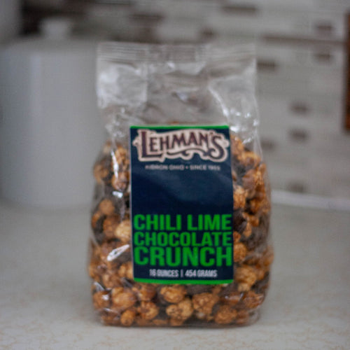 Clear bag of handcrafted chili lime chocolate popcorn crunch, a unique sweet and savory snack made in USA, perfect for Kitchen & Food, Snacks and Sweets, Popcorn, USA Made, and Best Sellers collections.