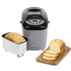 Electric bread maker machine in gray and black with digital control panel and removable baking pan alongside freshly baked loaf on wooden cutting board, featured in Kitchen & Food, Baking Supplies, and Kitchen Gadgets collections.