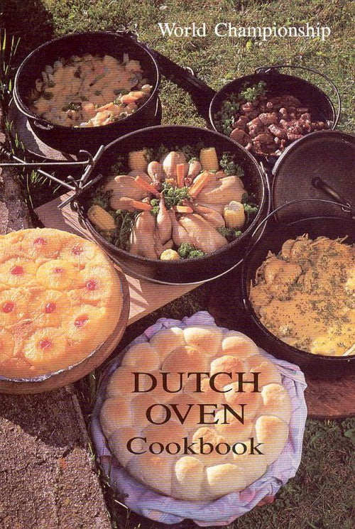 Outdoor setting displaying a variety of dishes cooked in handcrafted cast-iron Dutch ovens, including breads, vegetables, and meats, highlighting rustic cooking techniques featured in cookbooks collections.