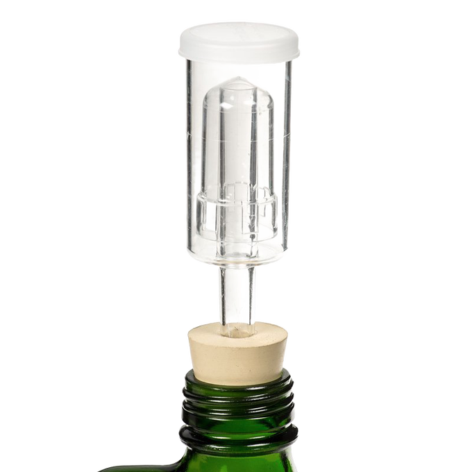 Clear 3-piece airlock and beige stopper securely fitted into a green bottle neck, designed for fermenting larger batches, featured in Kitchen & Food, Food Preservation, and Fermenting collections.