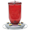 Tinted red glass hummingbird feeder with a metal base featuring flower-shaped feeding ports and a wire hanger, ideal for Farm, Garden & Tool, Animal Care, Best Sellers, and Promo Eligible collections.