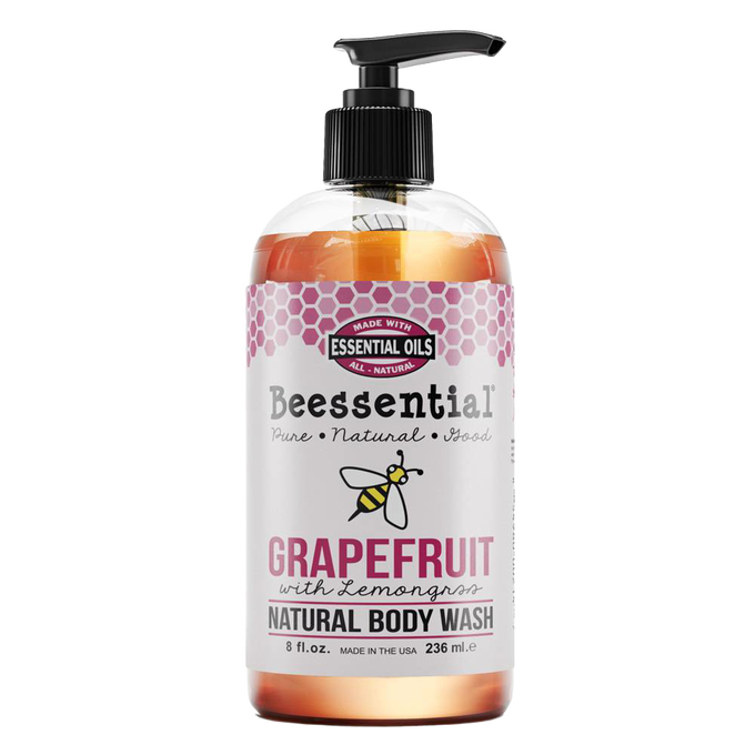 Clear pump bottle of natural grapefruit and lemongrass body wash made with essential oils, preservative and sulfate free, handcrafted and USA made, featured in Health & Wellness and Soaps collections.