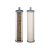 Two cylindrical replacement water filter elements for tabletop use, one showing granular filtration media inside, suitable for emergency supplies and water treatment appliances.