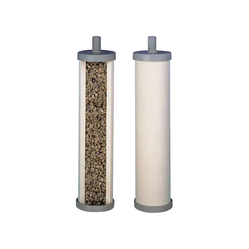 Two cylindrical replacement water filter elements for tabletop use, one showing granular filtration media inside, suitable for emergency supplies and water treatment appliances.