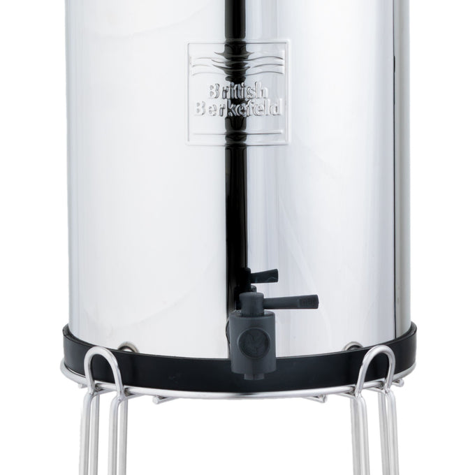 Handcrafted black plastic tap with lever for gravity water filters, mounted on stainless steel unit, designed for durability in Appliances, Emergency Supplies, and Water Heating collections.