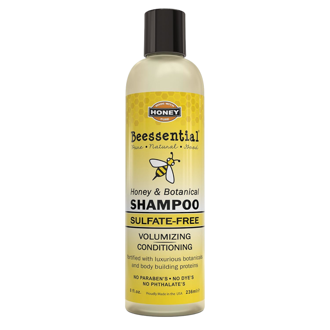 Handcrafted sulfate-free shampoo bottle featuring honey and botanical ingredients, designed for volumizing and conditioning, showcased in Health & Wellness and USA Made collections.