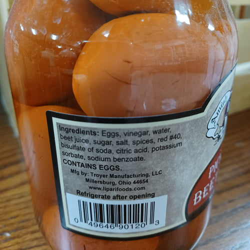 Glass jar of naturally preserved canned eggs in beet juice brine with vintage label and gold lid, handcrafted and made in USA, ideal for Kitchen & Food, Pantry, USA Made, Best Sellers, and Promo Eligible collections.