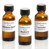Three amber glass bottles with black caps labeled with candle scents Christmas Spruce, Bayberry, and Lavender, perfect for candles and candlemaking supplies collections.