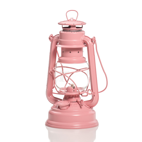 Classic-style pink galvanized oil lantern with heat-resistant glass globe and sturdy handle, perfect for camping, emergency supplies, and outdoor lighting needs.