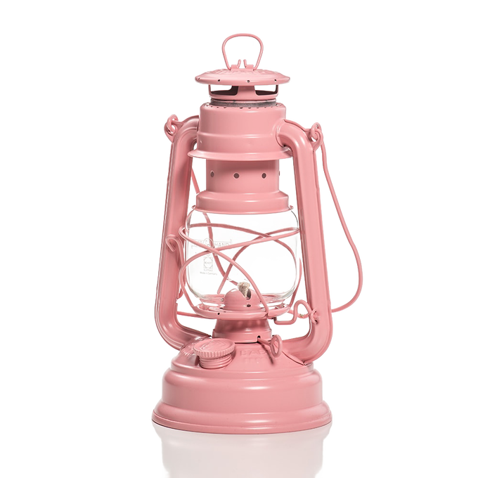 Classic-style pink galvanized oil lantern with heat-resistant glass globe and sturdy handle, perfect for camping, emergency supplies, and outdoor lighting needs.