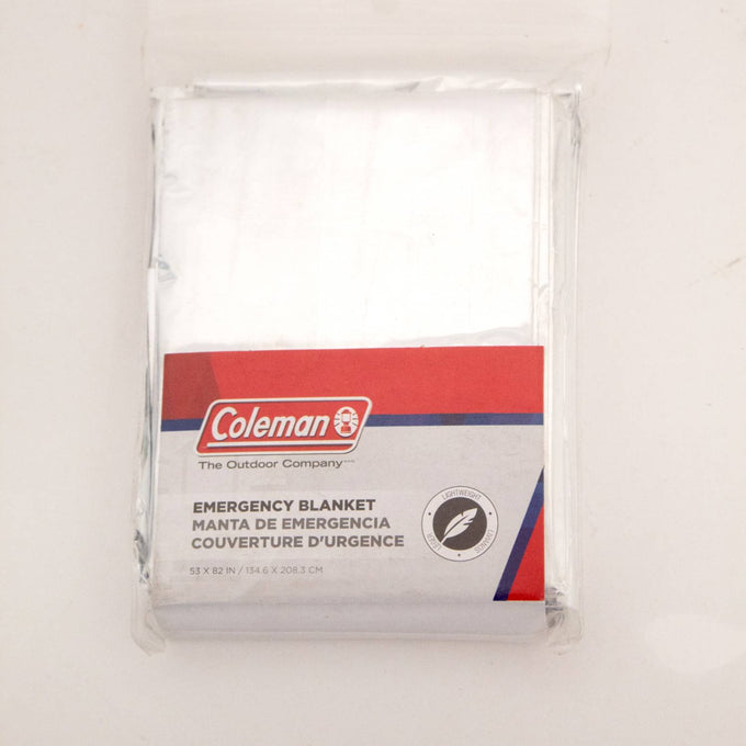 Coleman emergency blanket packaged in clear plastic with red and gray label, designed for warmth and protection in camping, emergency supplies, farm, garden, and tool collections.