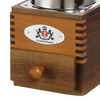 Close-up of the handcrafted wooden base and small drawer of a top-crank coffee mill with a polished steel hopper, ideal for Farm, Garden & Tool, Kitchen & Food, and Brewing Coffee and Tea collections.