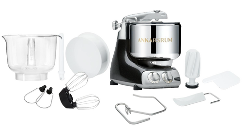 Ankarsrum Assistent Original stand mixer in black with stainless steel mixing bowl and various attachments displayed on a white surface, ideal for Kitchen & Food and Baking Supplies collections.