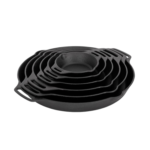 Stack of handcrafted cast iron pans with two side handles, designed for durable use in farm, garden, camping, kitchen, cookware, and cast iron collections.