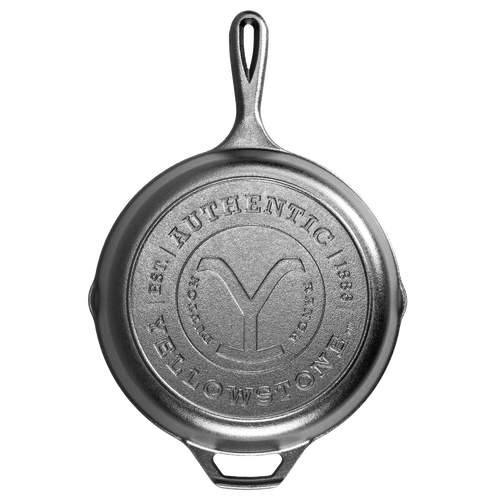 Top view of a handcrafted cast iron skillet featuring a stamped "Authentic Yellowstone" emblem, made in USA, ideal for Kitchen & Food and Cast Iron cookware collections.