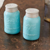 Handcrafted ceramic salt and pepper shakers with a light blue mason jar design, featuring white tops, perfect for Kitchen & Food, Dinnerware, Kitchen Gadgets, and Accessories collections.