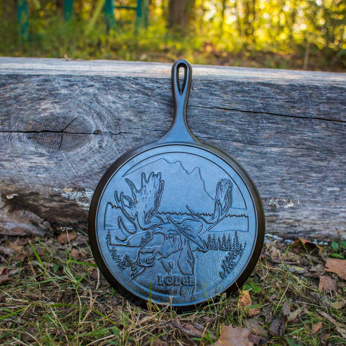 Cast iron griddle featuring a detailed moose design with Northwoods scenery, handcrafted in the USA, ideal for Kitchen & Food, Cookware, Cast Iron, USA Made, and Best Sellers collections.
