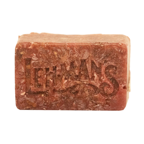 Handcrafted reddish-brown fire starter block embossed with Lehman’s logo, made in USA from natural reclaimed wax and sawdust, perfect for Farm, Garden & Tool, Stoves, Camping, and Hearth Accessories.