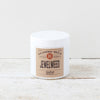 White jar of handcrafted jewelweed salve with a natural label, made in the USA, featured in Health & Wellness, Balms, Creams and Lotions, and Best Sellers collections.