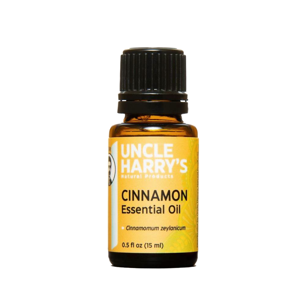 Amber glass bottle of handcrafted cinnamon essential oil with black cap and yellow label, made in USA, ideal for Health & Wellness, Soapmaking, Candlemaking, and Health Remedies collections.