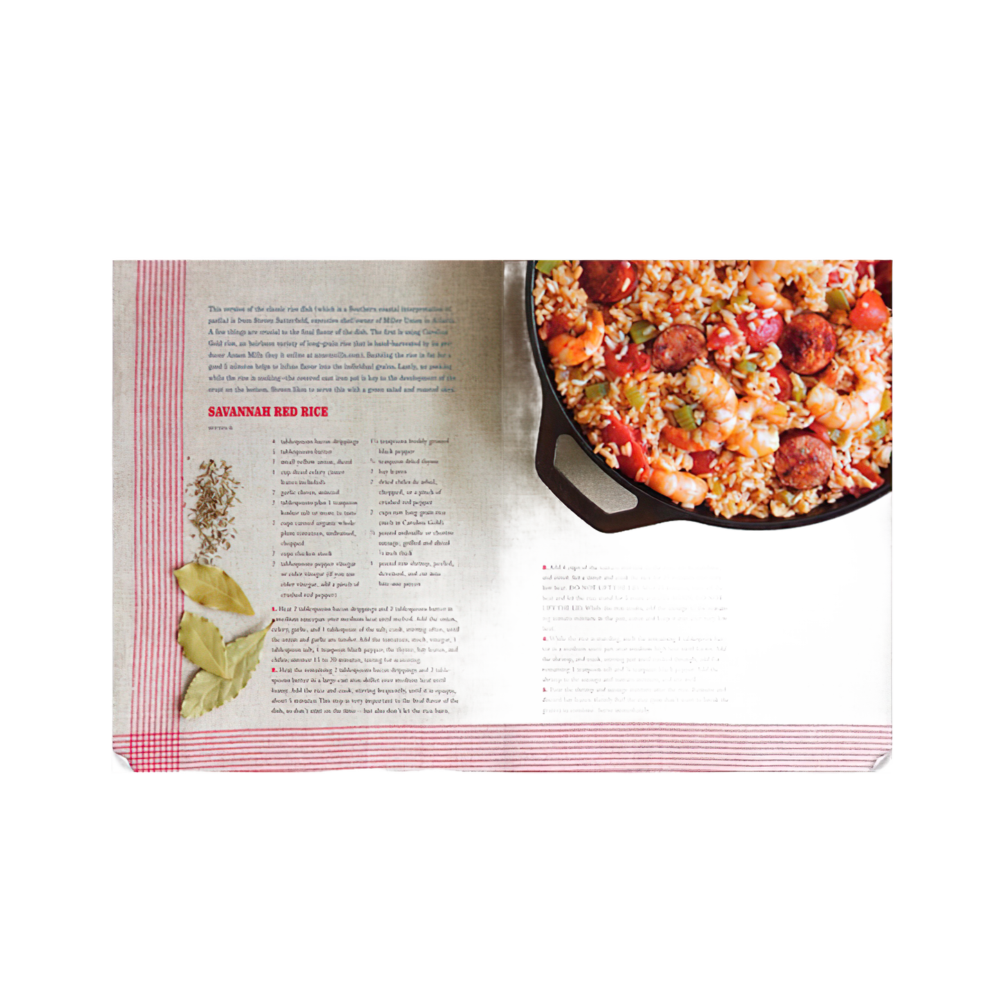 Open cookbook spread with a colorful cast iron skillet filled with savory red rice and sausage dish, featuring a rustic recipe layout and illustrated ingredient accents, ideal for Toys, Books & Games, Books, Cookbooks, and Best Sellers collections.