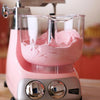 Pink stand mixer bowl filled with thick batter attached to a retro-style base, ideal for Kitchen & Food, Baking Supplies, Cookware, and Kitchen Gadgets collections.