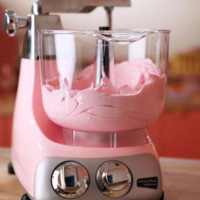 Pink stand mixer bowl filled with thick batter attached to a retro-style base, ideal for Kitchen & Food, Baking Supplies, Cookware, and Kitchen Gadgets collections.