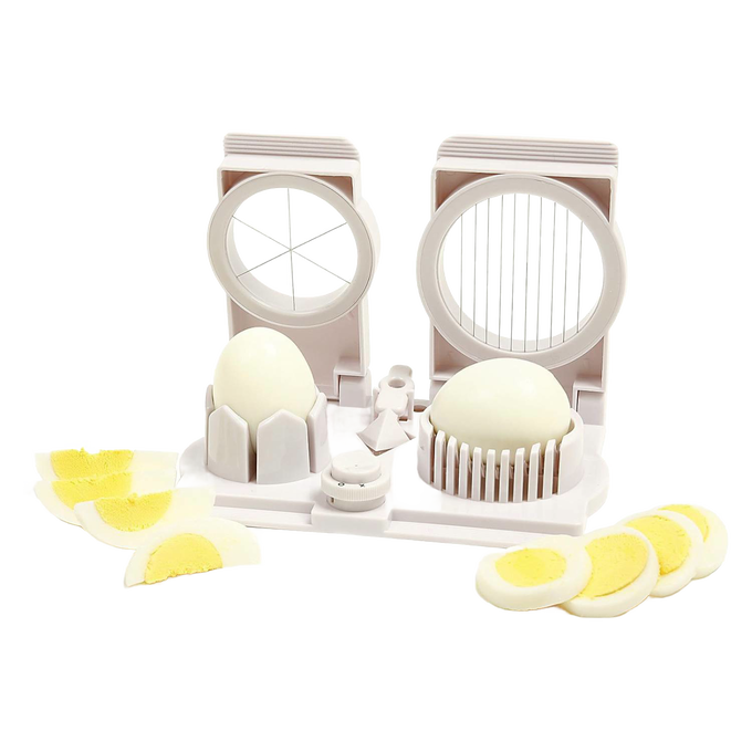 Double-sided egg slicer tool with white plastic frame featuring 10-slice and 6-wedge cutters, demonstrating sliced and wedged hard-boiled eggs for kitchen and food prep collections.
