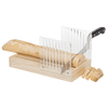 Wooden bread slicing guide with clear acrylic panels to create even slices, shown with a baguette partially sliced using a knife, featured in Kitchen & Food and Bread Making Supplies collections.