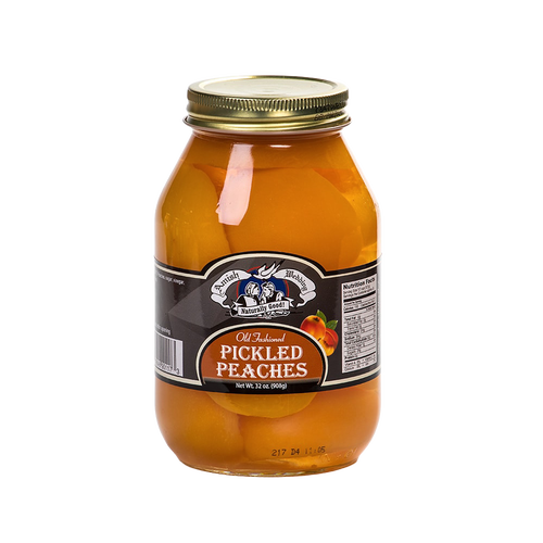 Handcrafted glass jar of pickled peaches in natural syrup with a metal lid, made in USA, featured in Kitchen & Food, Food, Pantry, USA Made, Best Sellers, Promo Eligible collections.