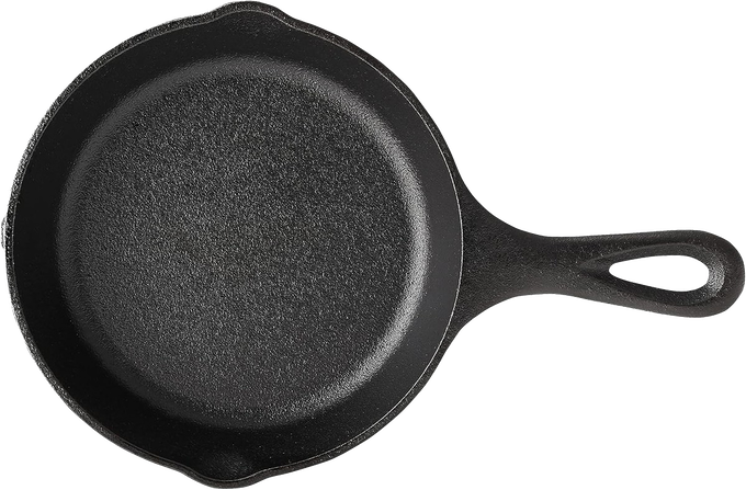 Small 6.5-inch cast iron skillet with a howling wolf design on the cooking surface, handcrafted in the USA, perfect for Kitchen & Food, Cookware, Cast Iron, and Best Sellers collections.