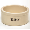 Glossy natural stoneware pet bowl labeled "Kitty," handcrafted in the USA for sturdy use in pet supplies, Home & Decor, Best Sellers, and Promo Eligible collections.