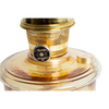Close-up of the top portion of a handcrafted amber glass wall oil lamp with a polished brass burner and wick adjustment knob, ideal for lamps and lighting, emergency supplies, and farm tool collections.