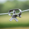 Handcrafted rustproof zinc pulley securely attached to durable plastic coated stranded wire cable for outdoor laundry use, featured in Home & Decor and Laundry Supplies collections.
