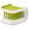 Compact knife and cutlery cleaning brush with lime green bristles and white ergonomic handle, designed for safe and efficient kitchen cleaning in household and kitchen gadget collections.