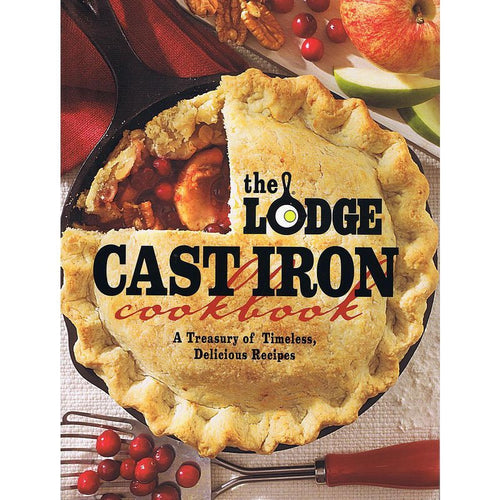 Handcrafted cast iron skillet baked fruit pie with a golden flaky crust, surrounded by fresh apples, cranberries, and walnuts, perfect for Toys, Books & Games and Cookbooks collections.