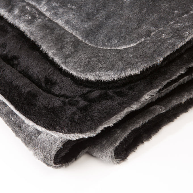 Soft handcrafted Amish made lap robe in dark gray and black with plush faux fur exterior and quilted synthetic lining, ideal for Home Textiles, Emergency Supplies, and USA Made collections.