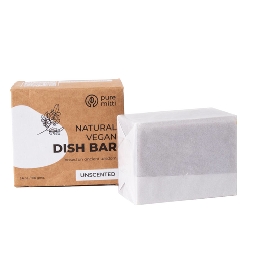 Handcrafted chemical-free natural dish soap bar unscented and vegan, wrapped in white paper beside recyclable brown cardboard box, suitable for household cleaning and Home & Decor collections.